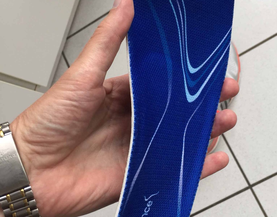 A real photo of a supportive insole that may help reduce pressure through the foot