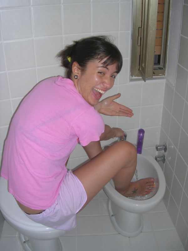 A foot being washed and checked carefully, showing the hygiene context for itchy or peeling skin
