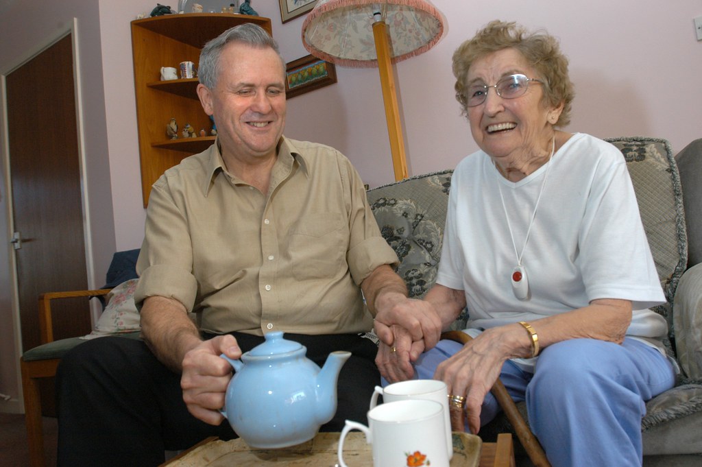 A home care conversation with an older adult, showing the kind of setting where home visit foot care questions often start