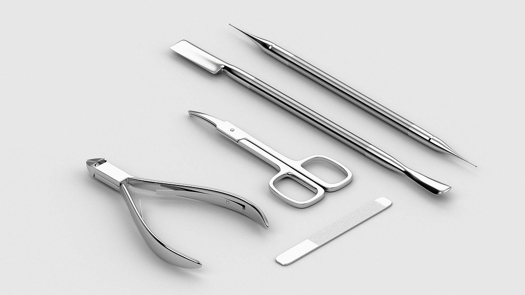 A nail care tool set laid out clearly