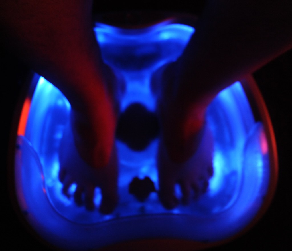 Feet soaking in warm water before nail care