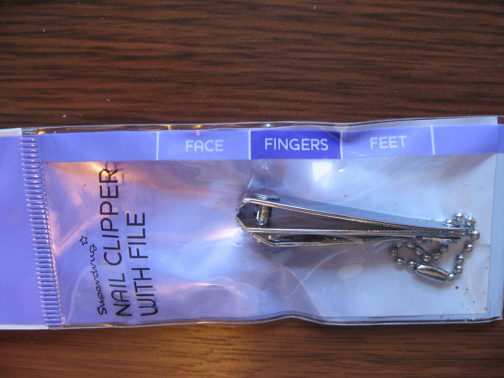 Nail clippers ready for careful toenail cutting
